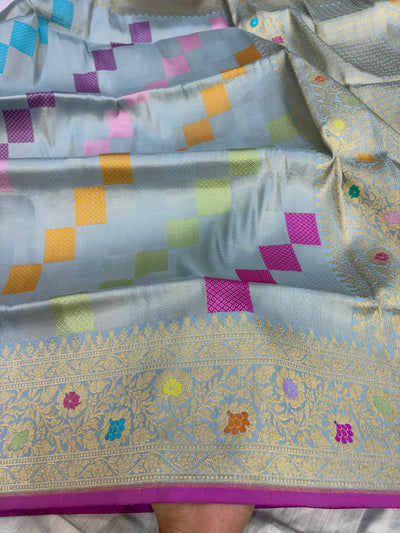 Pure katan tissue silk saree in powder blue colour with multiple meenakari work