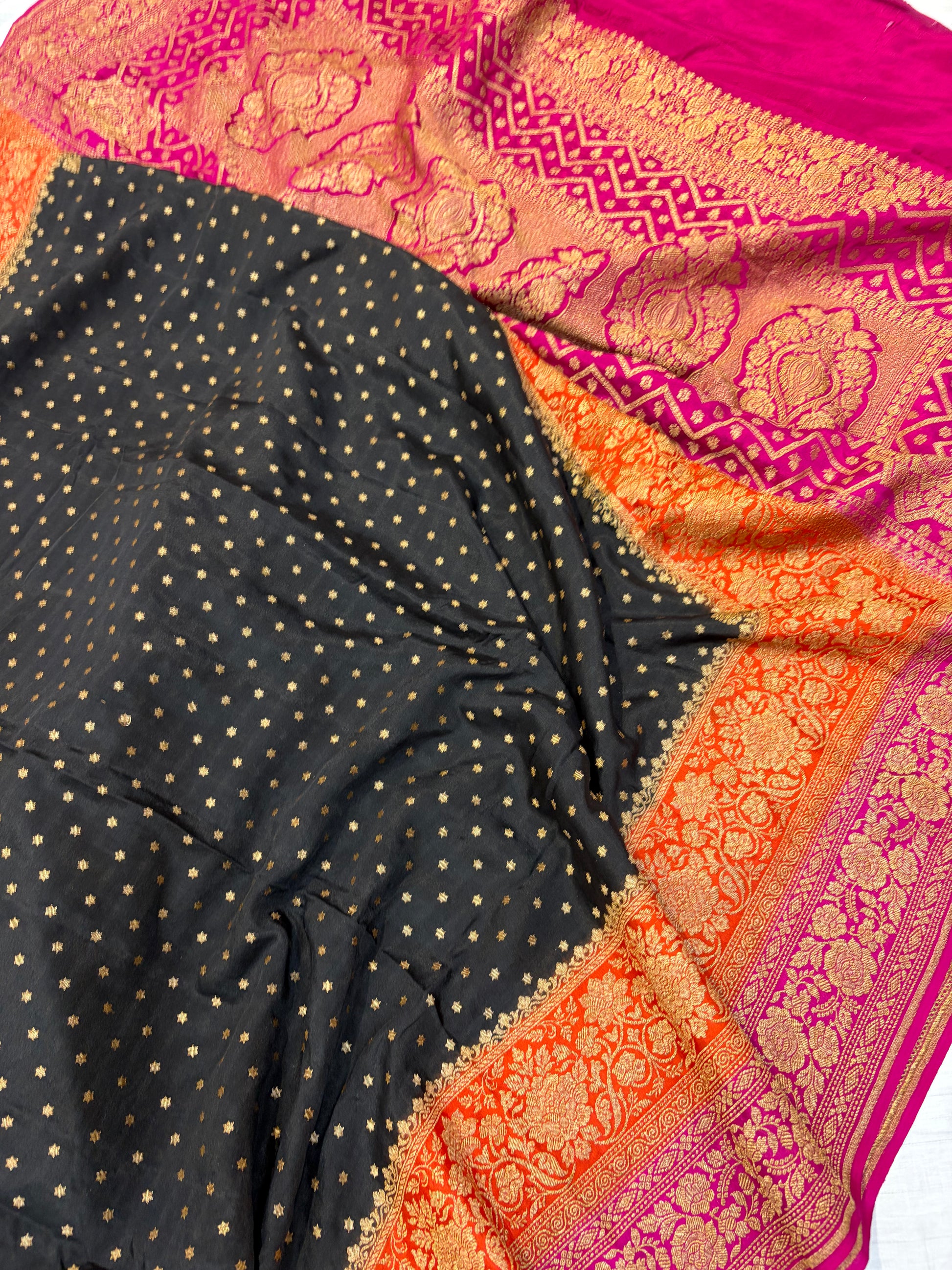Pure khaddi crepe silk saree with 3D border in black orange & rani pink colour combination