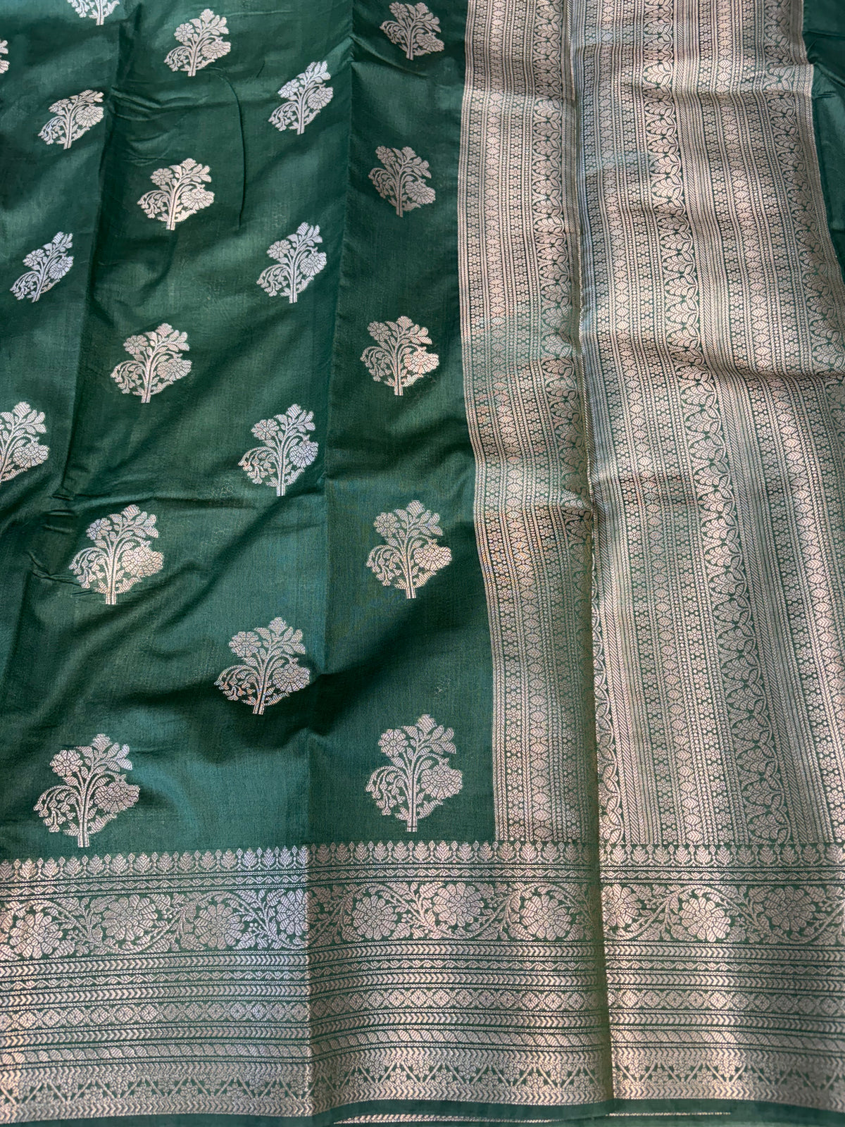 Banarasi soft katan silk saree in bottle green colour