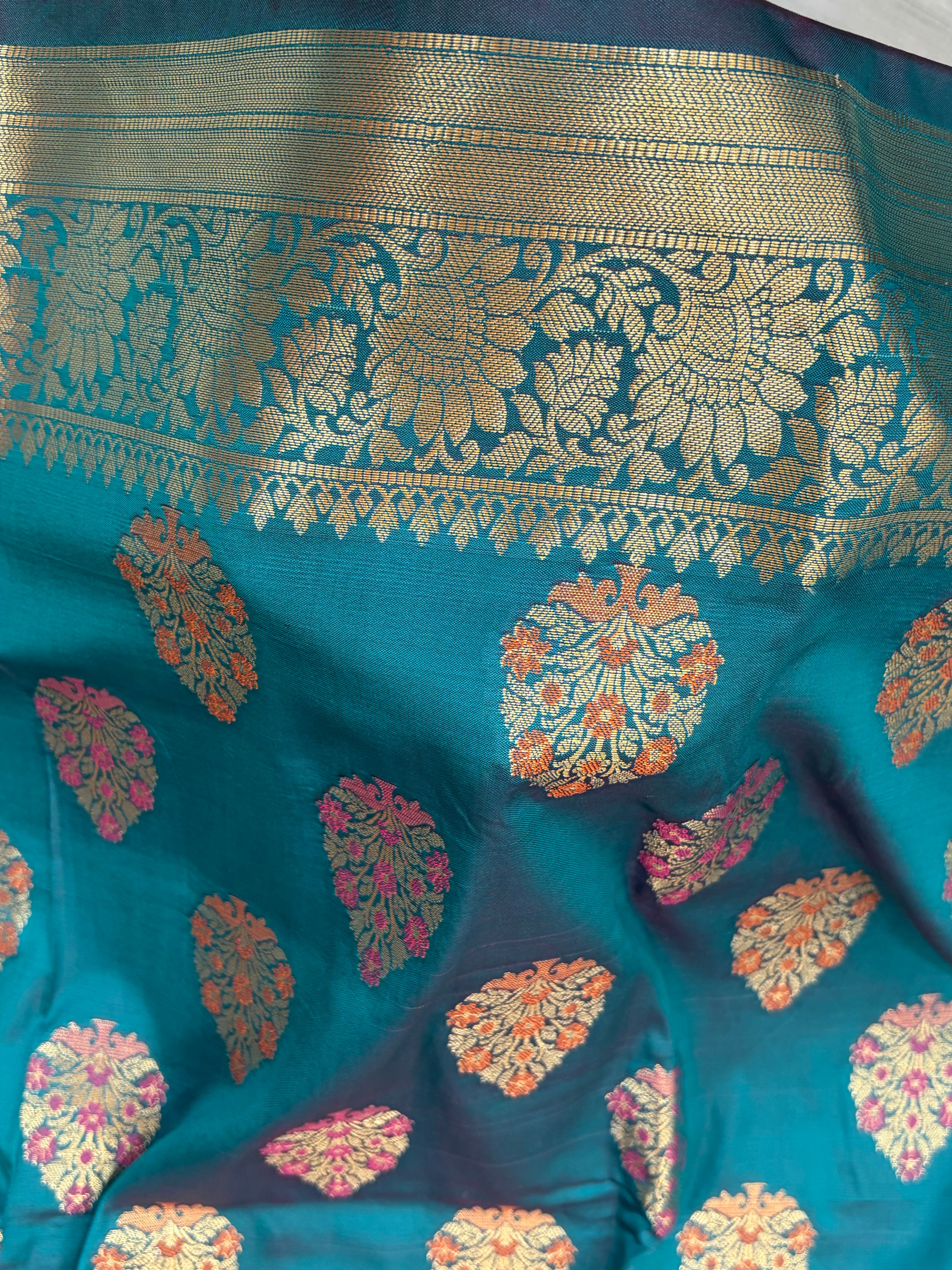 Banarasi katan by katan silk saree in Rama green colour with multiple meenakari work