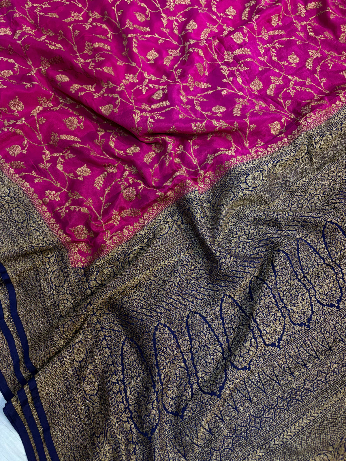 Pure khaddi crepe silk saree with all over jaal work in Rani with navy blue colour combination