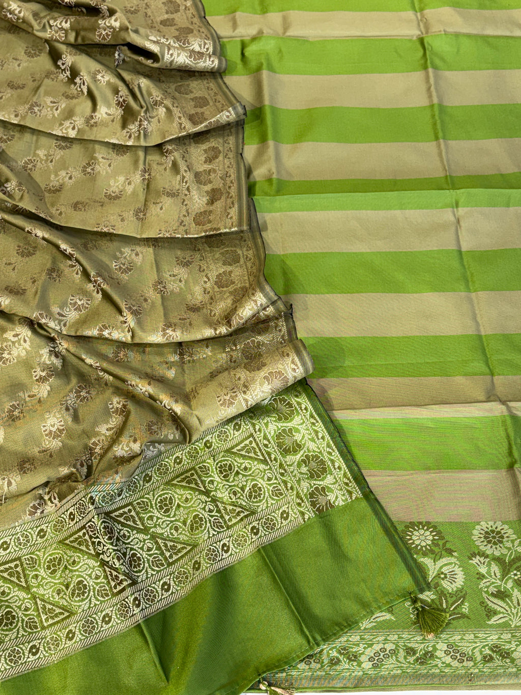 Banarasi soft silk suit in parrot green with olive colour combination with tussels