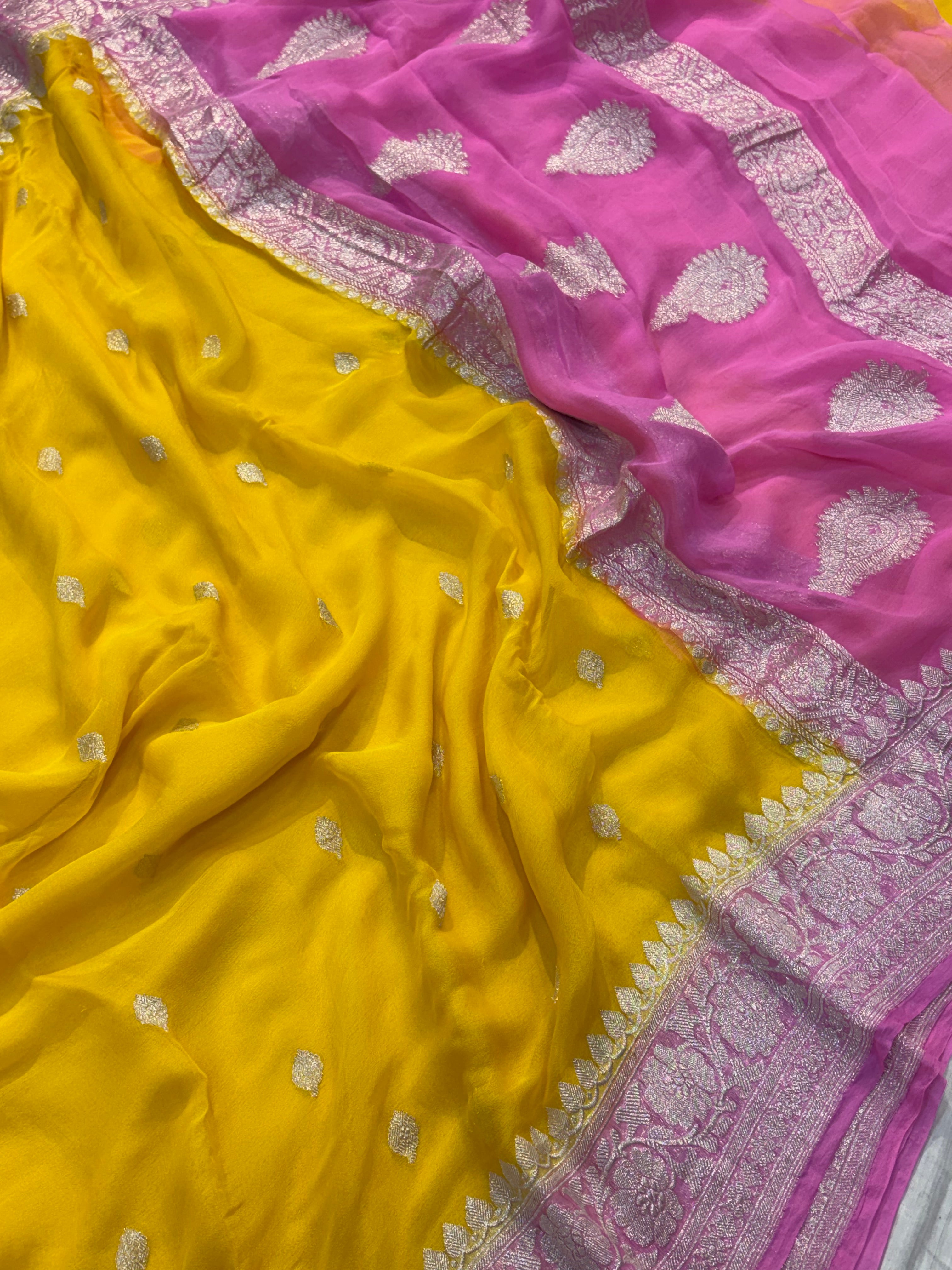 Pure khaddi chiffon saree in yellow with pink colour combination