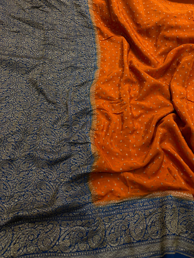 Pure khaddi crepe silk saree in Rust orange with navy blue colour