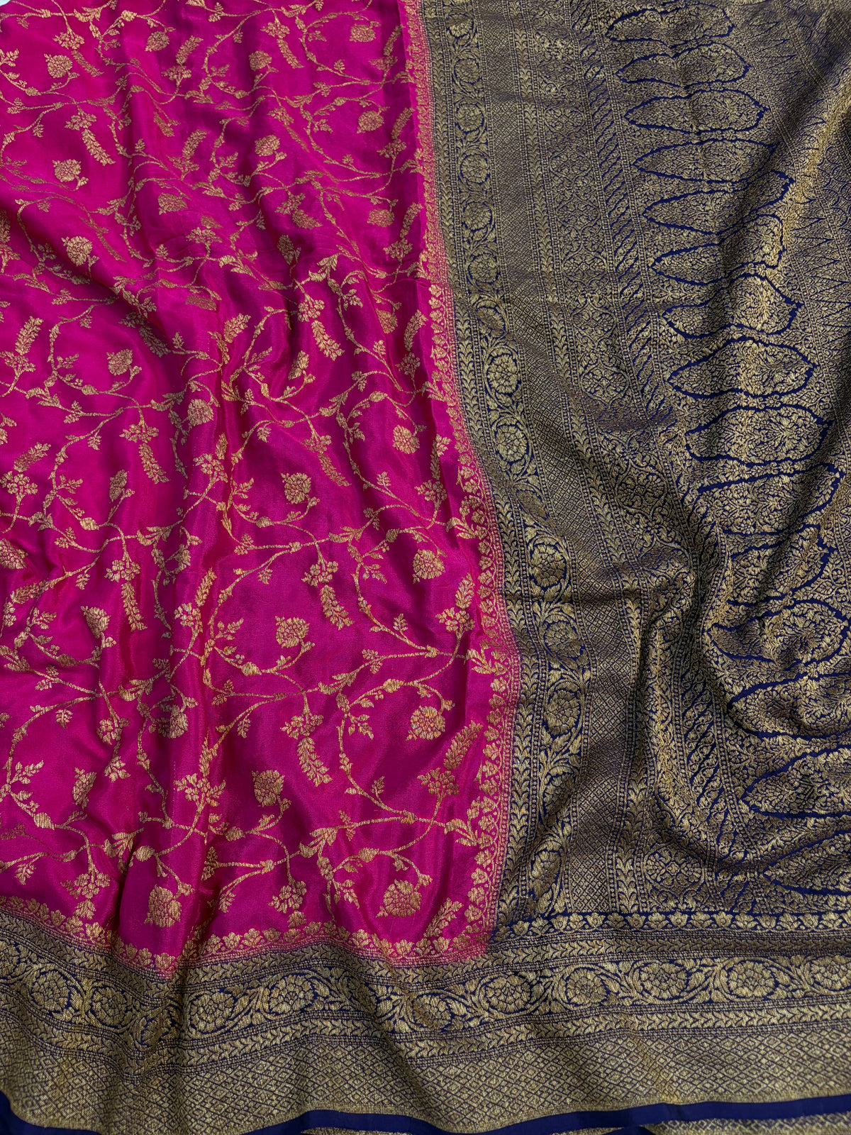 Pure khaddi crepe silk saree with all over jaal work in Rani with navy blue colour combination