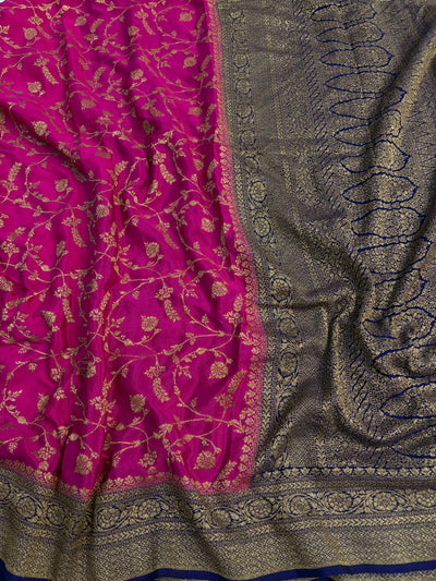 Pure khaddi crepe silk saree with all over jaal work in Rani with navy blue colour combination