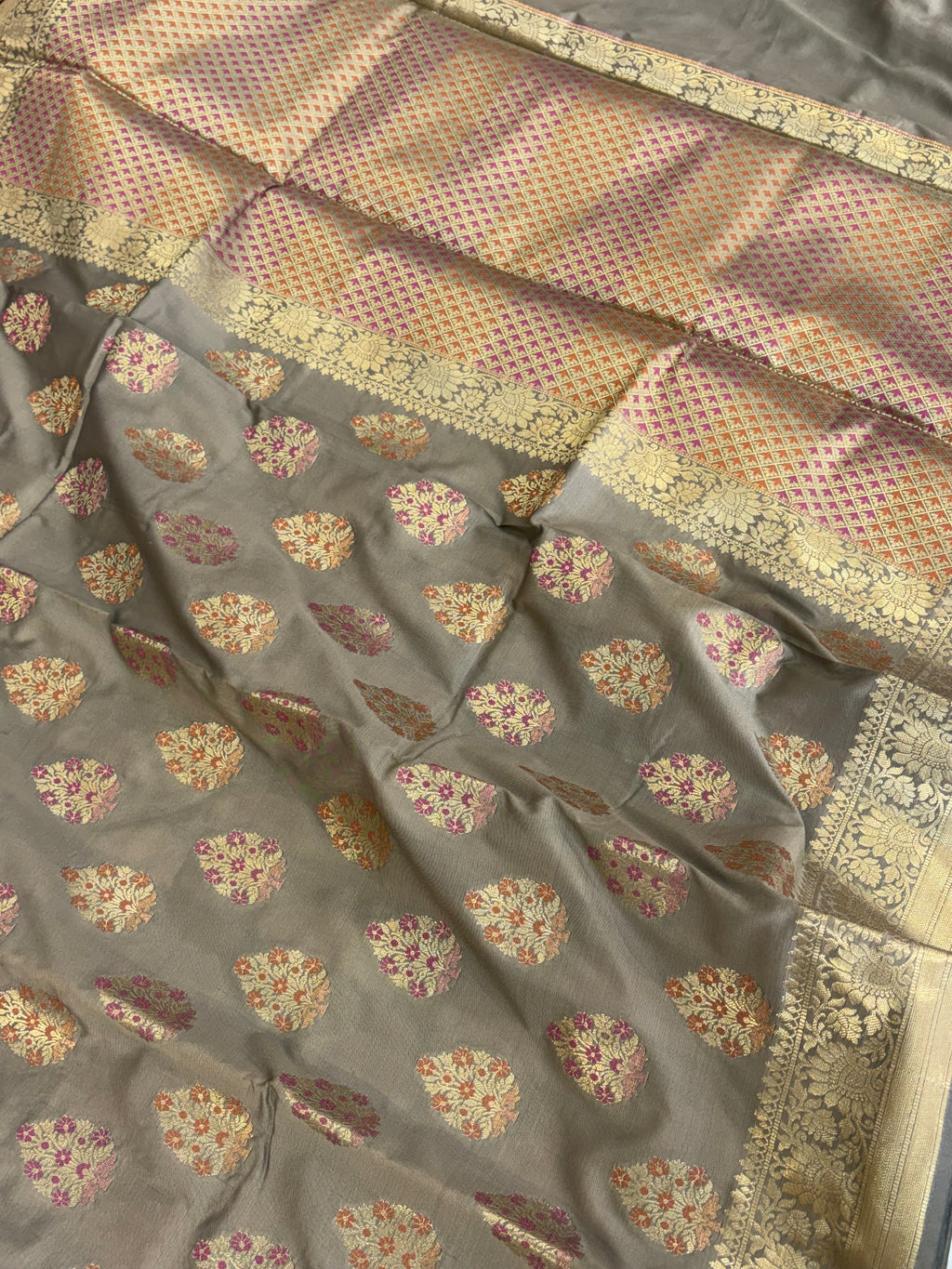 Banarasi katan by katan silk saree in dusty grey colour with multiple meenakari work