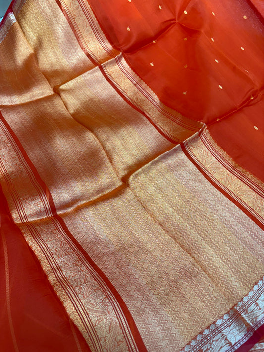 Pure handloom organza silk saree In orange colour with red piping border