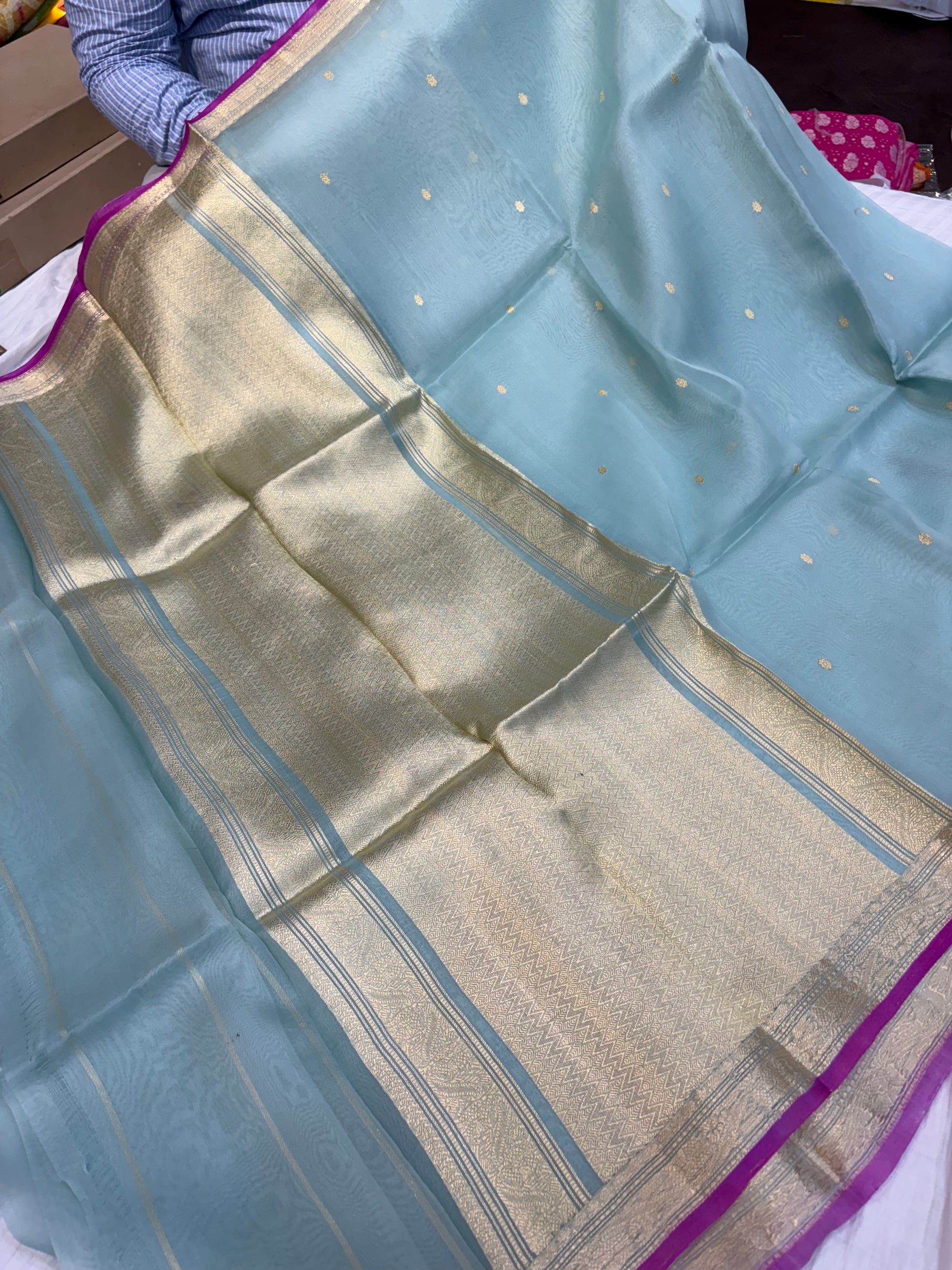 Pure handloom organza silk saree In powder blue colour with Magenta piping border