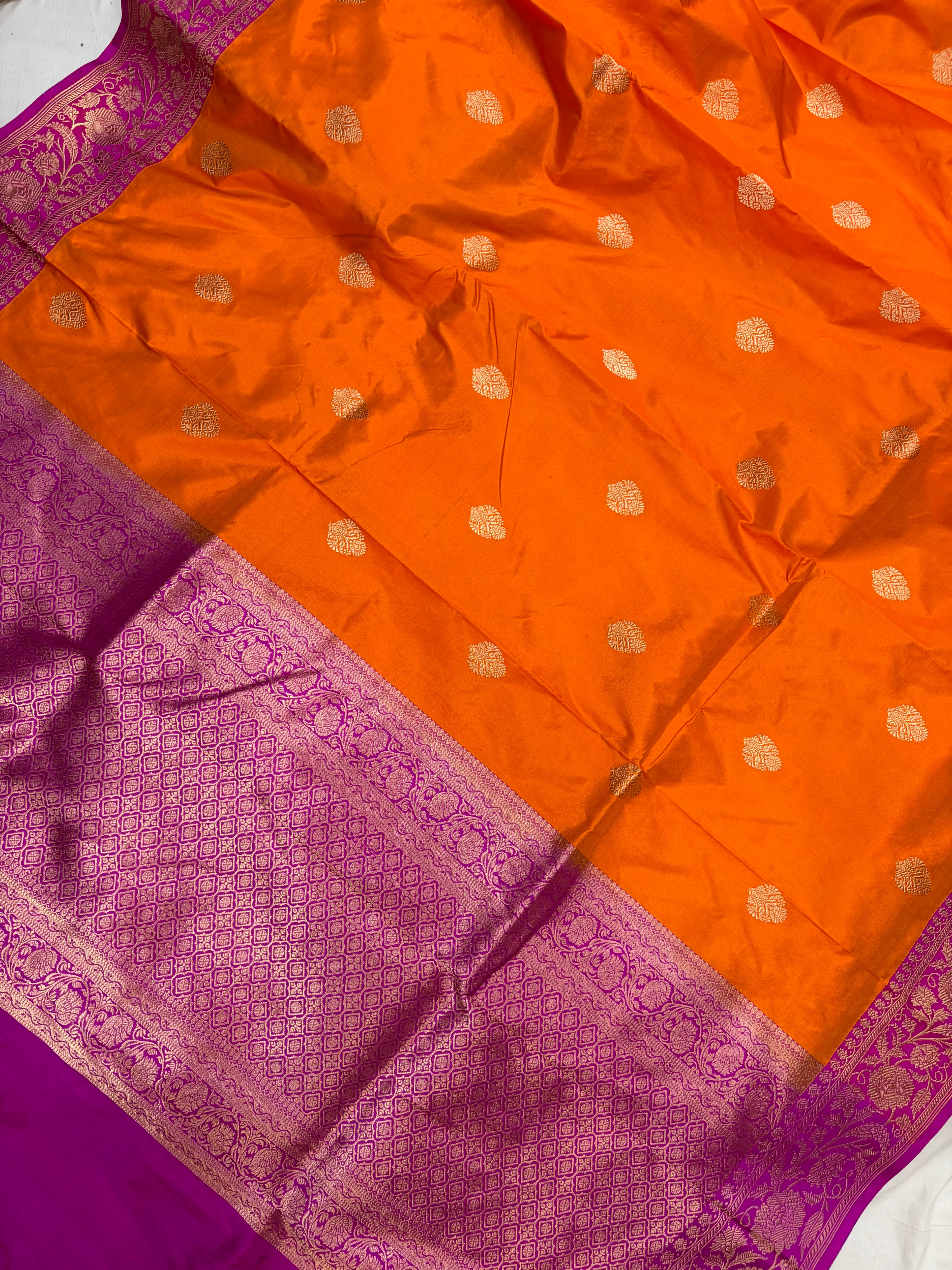 Pure handwoven katan silk saree in orange with Rani  colour