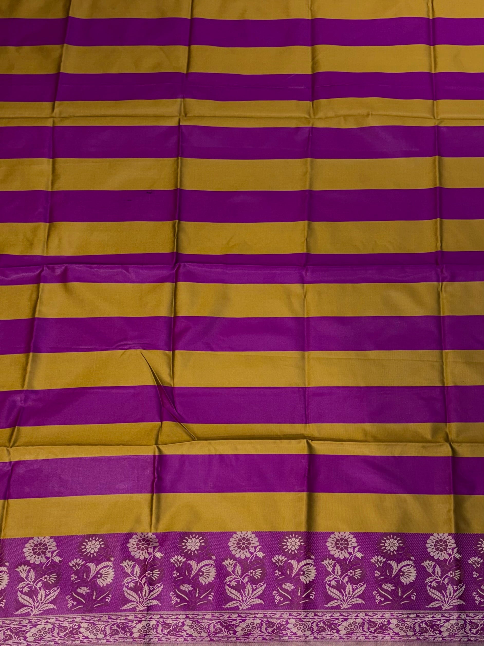 Banarasi soft silk suit in mustard yellow with magenta pink colour combination with tussels