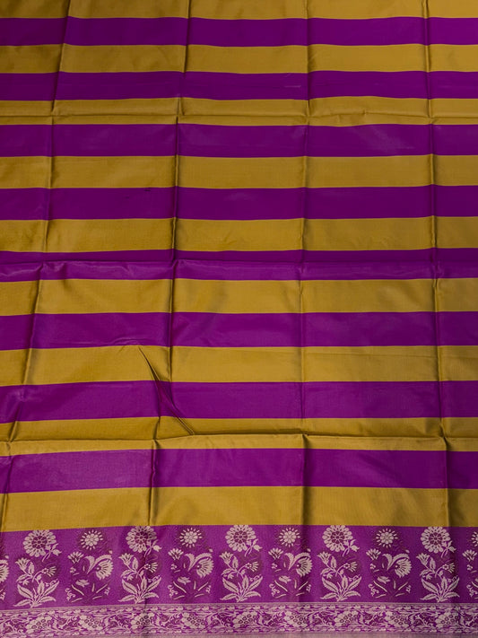 Banarasi soft silk suit in mustard yellow with magenta pink colour combination with tussels