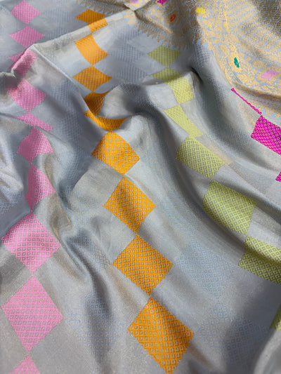 Pure katan tissue silk saree in powder blue colour with multiple meenakari work