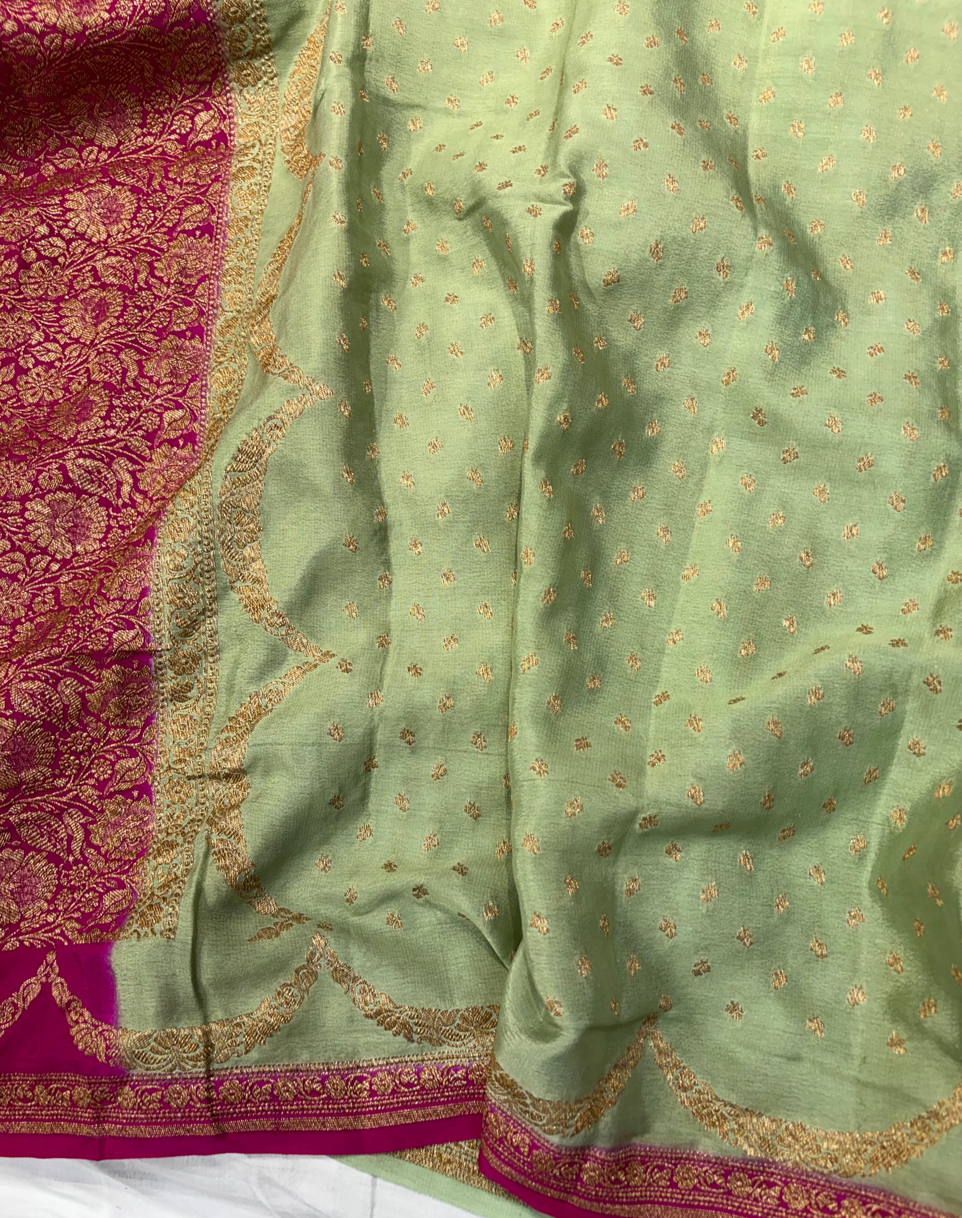 Pure khaddi crepe silk saree in pista green with Rani pink colour