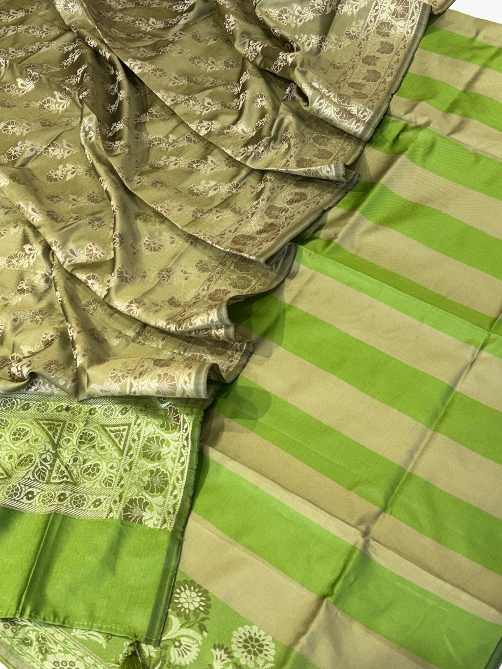 Banarasi soft silk suit in parrot green with olive colour combination with tussels