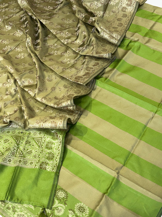Banarasi soft silk suit in parrot green with olive colour combination with tussels