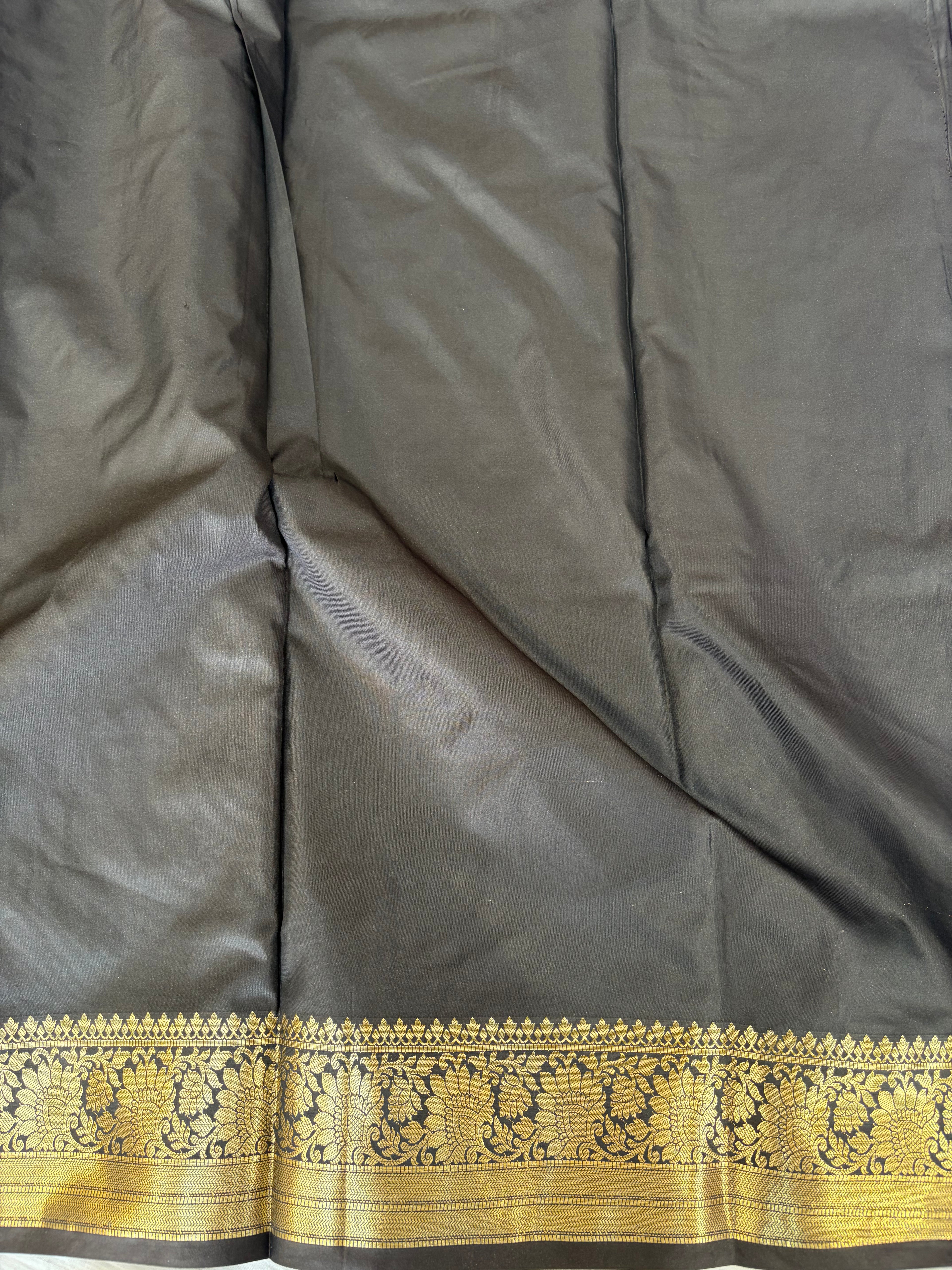 Banarasi katan by katan silk saree in black colour with multiple meenakari work