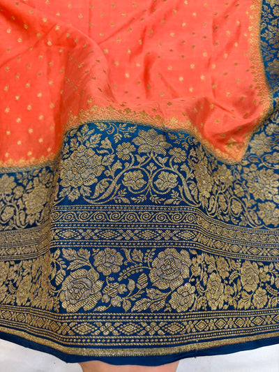 Pure khaddi crepe silk saree in peach & German blue colour