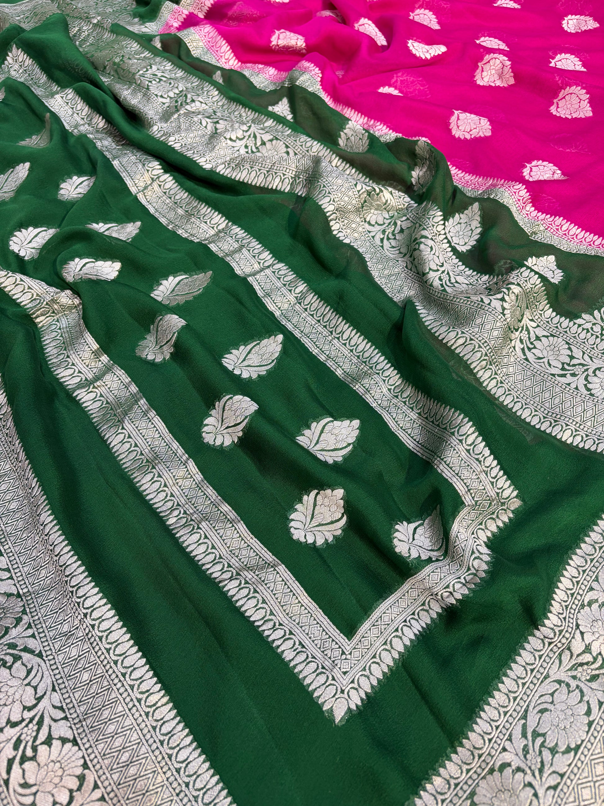 Pure georgette silk saree in temple design in a beautiful combination of Rani with bottle green colour
