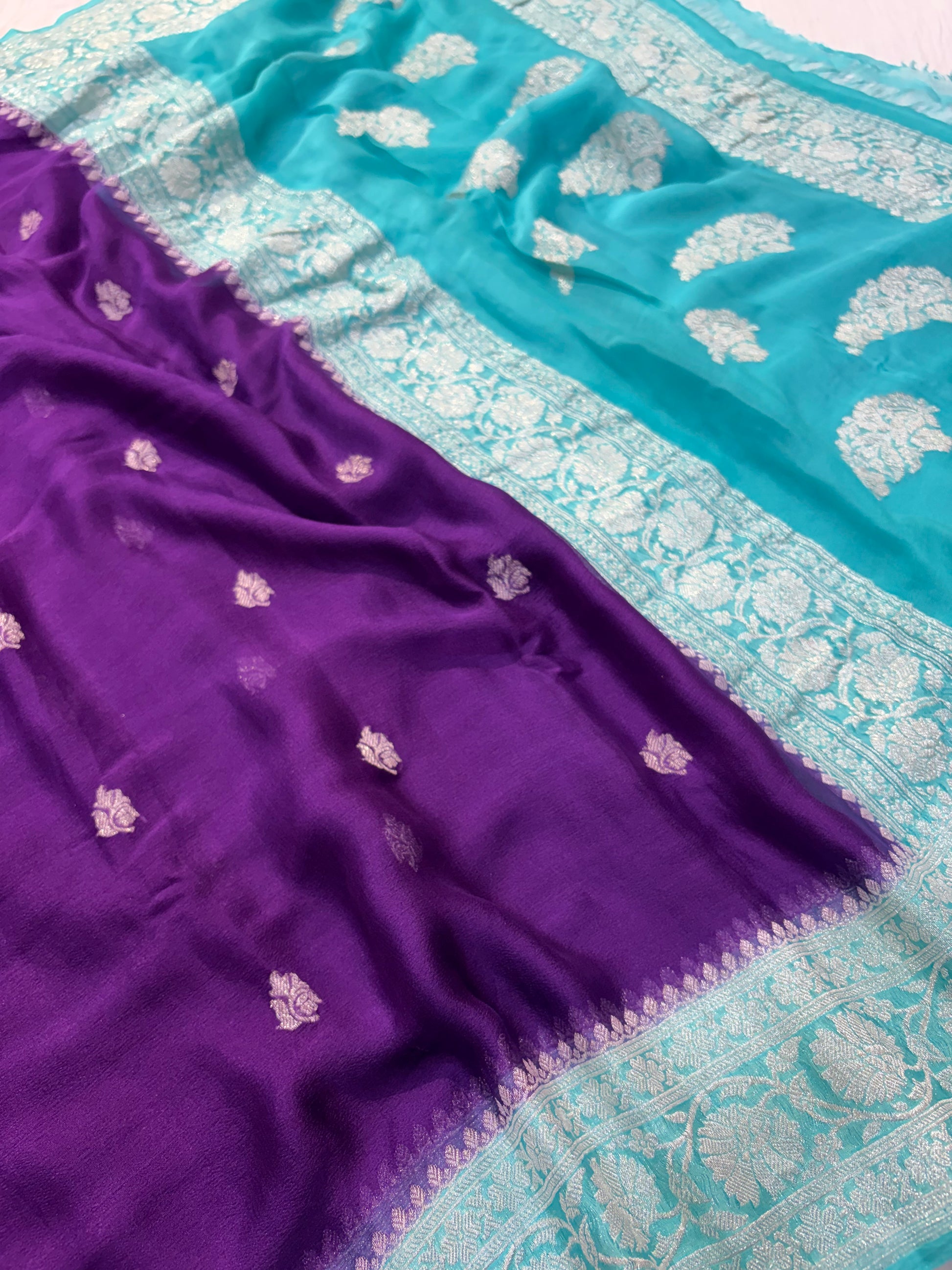 Pure khaddi chiffon saree in purple with ocean blue colour combination