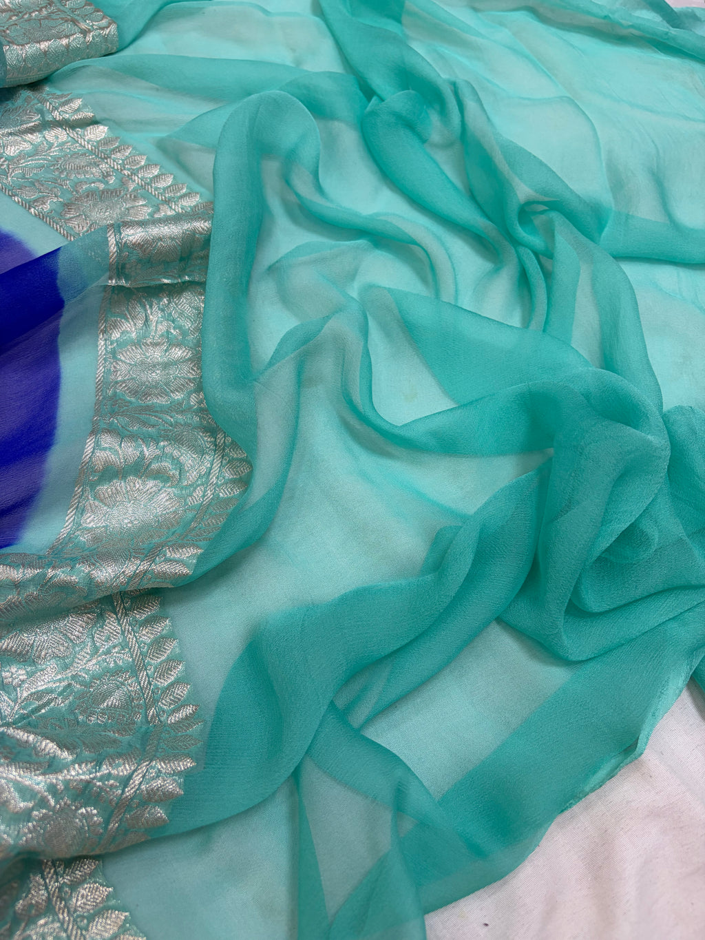 Pure khaddi chiffon saree in Royal blue and sea green colour