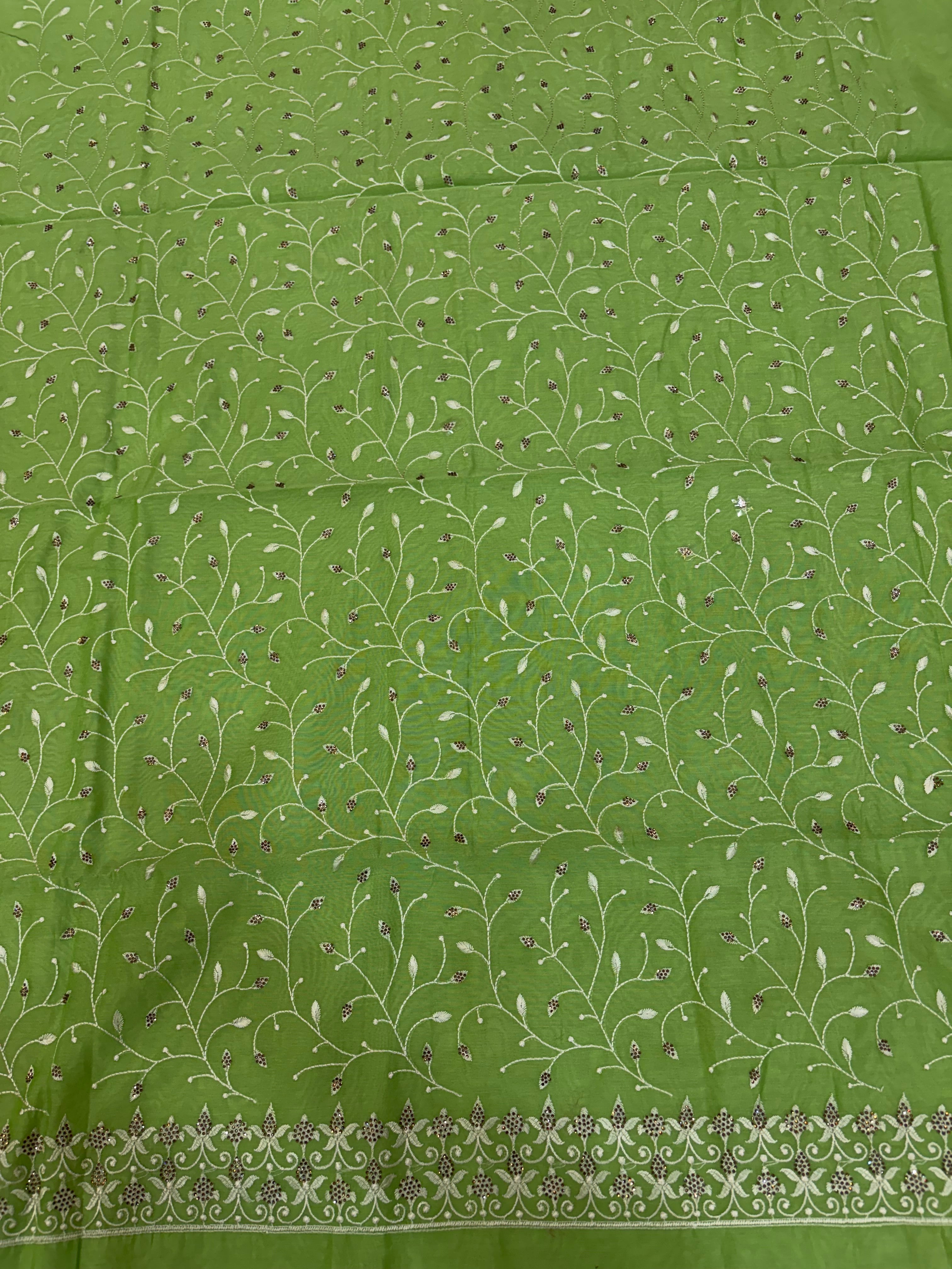 Banarasi pista green soft silk suit with all over embroidery work