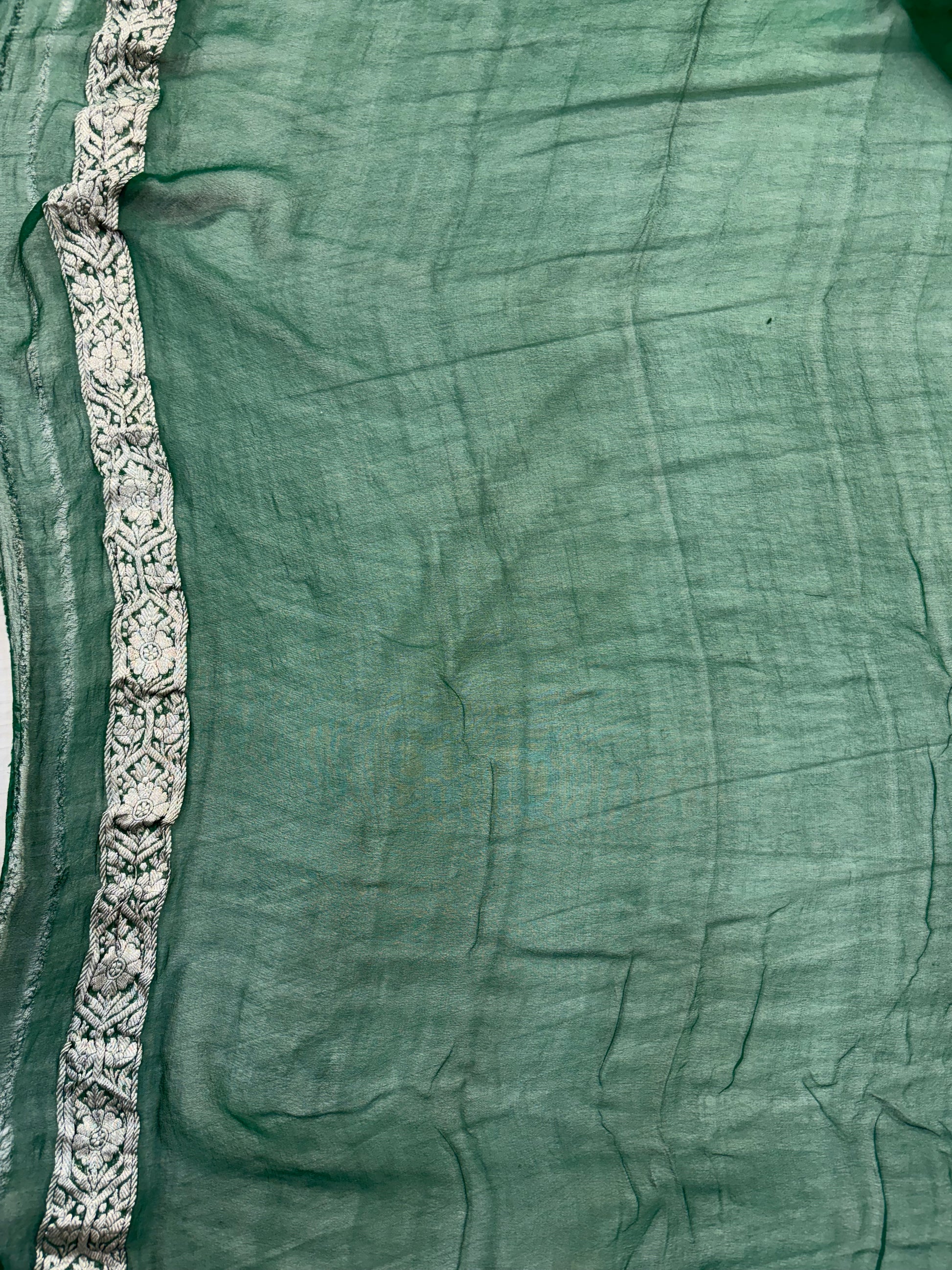 Pure khaddi chiffon saree in rust orange with bottle green colour