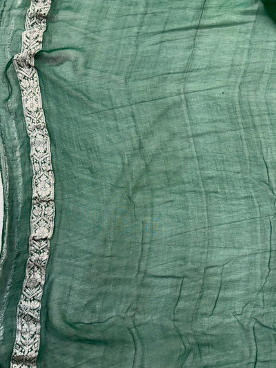 Pure khaddi chiffon saree in rust orange with bottle green colour