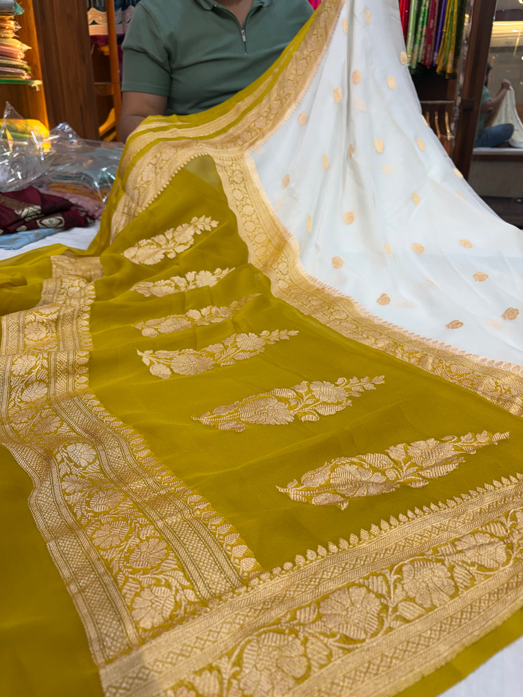 Pure khaddi chiffon saree with gold zari work in off white with olive yellow colour