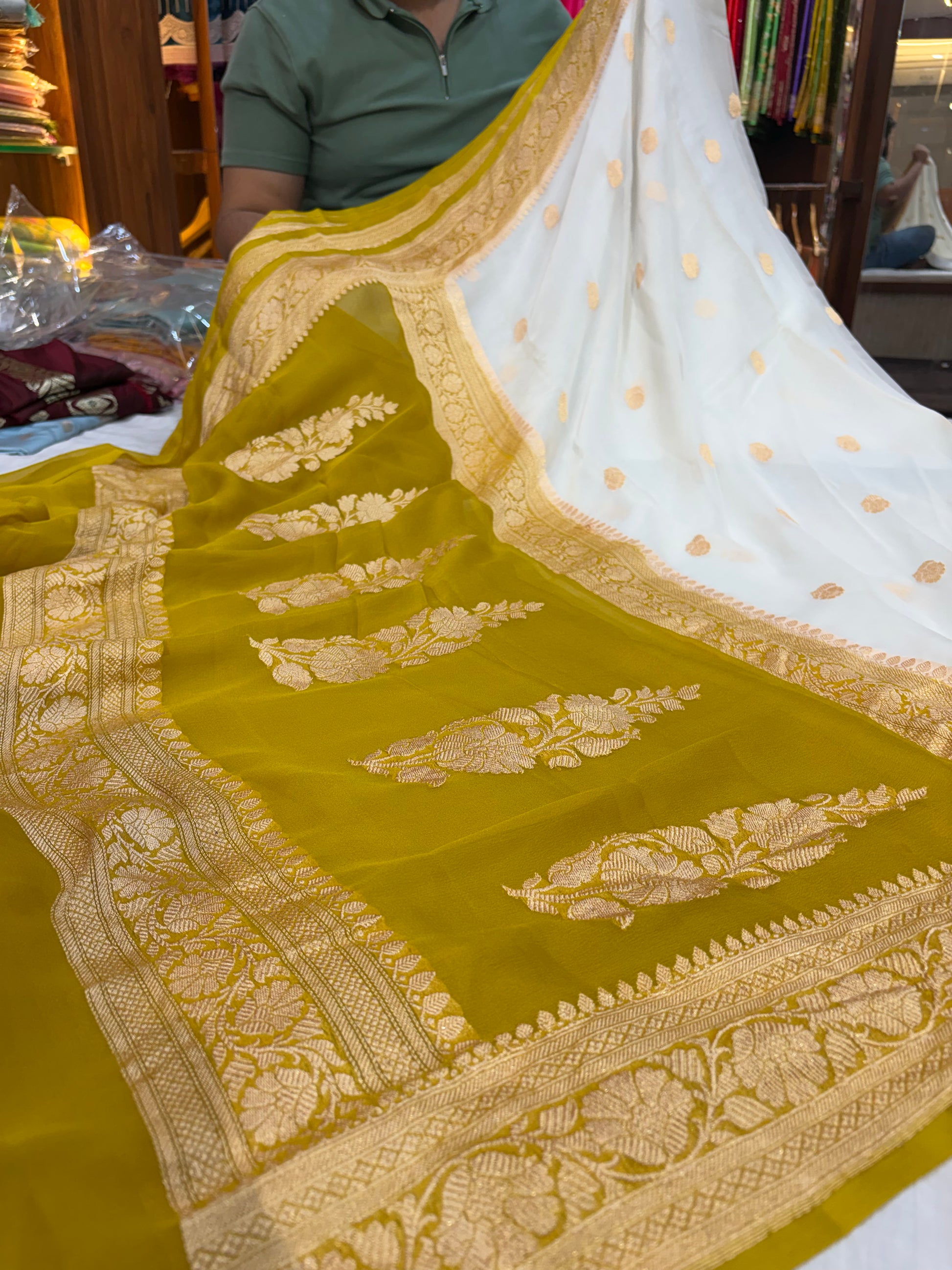 Pure khaddi chiffon saree with gold zari work in off white with olive yellow colour