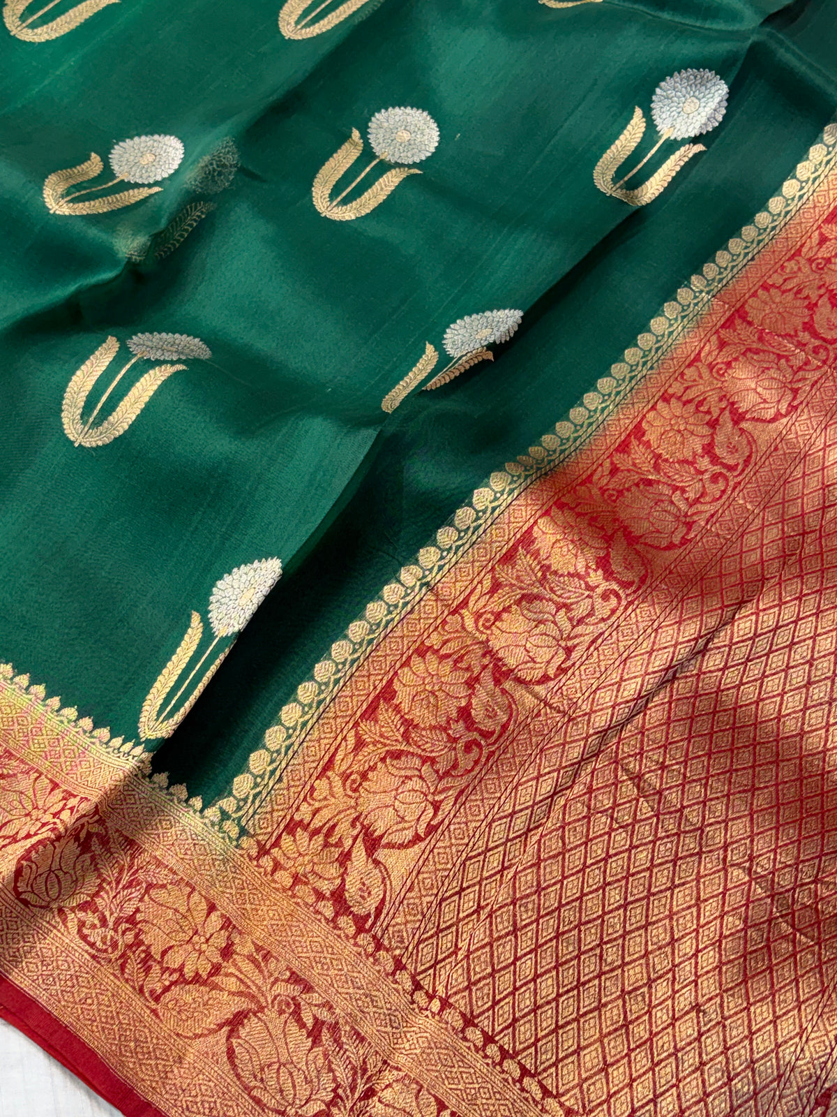 Pure handloom kora silk saree in bottle green with red colour