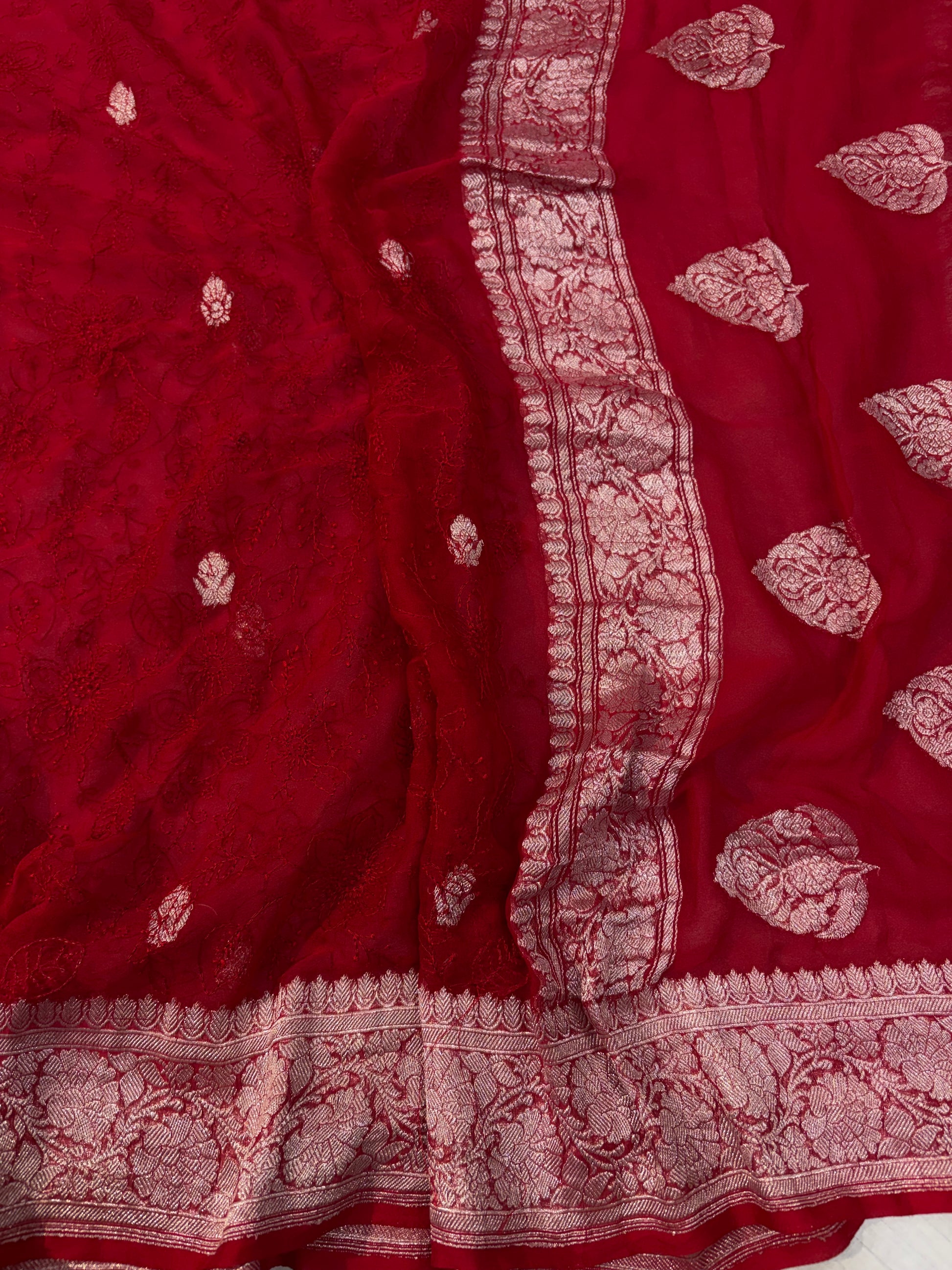 Pure khaddi chiffon saree in red colohr with all over chickenkari work