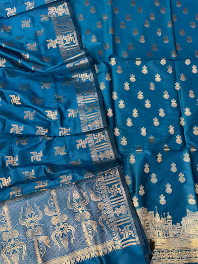 Banarasi soft silk suit in Teal blue colour with temple design work