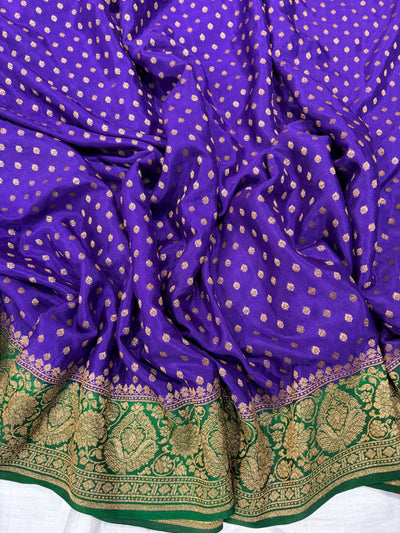 Pure khaddi crepe silk saree in purple with bottle green colour