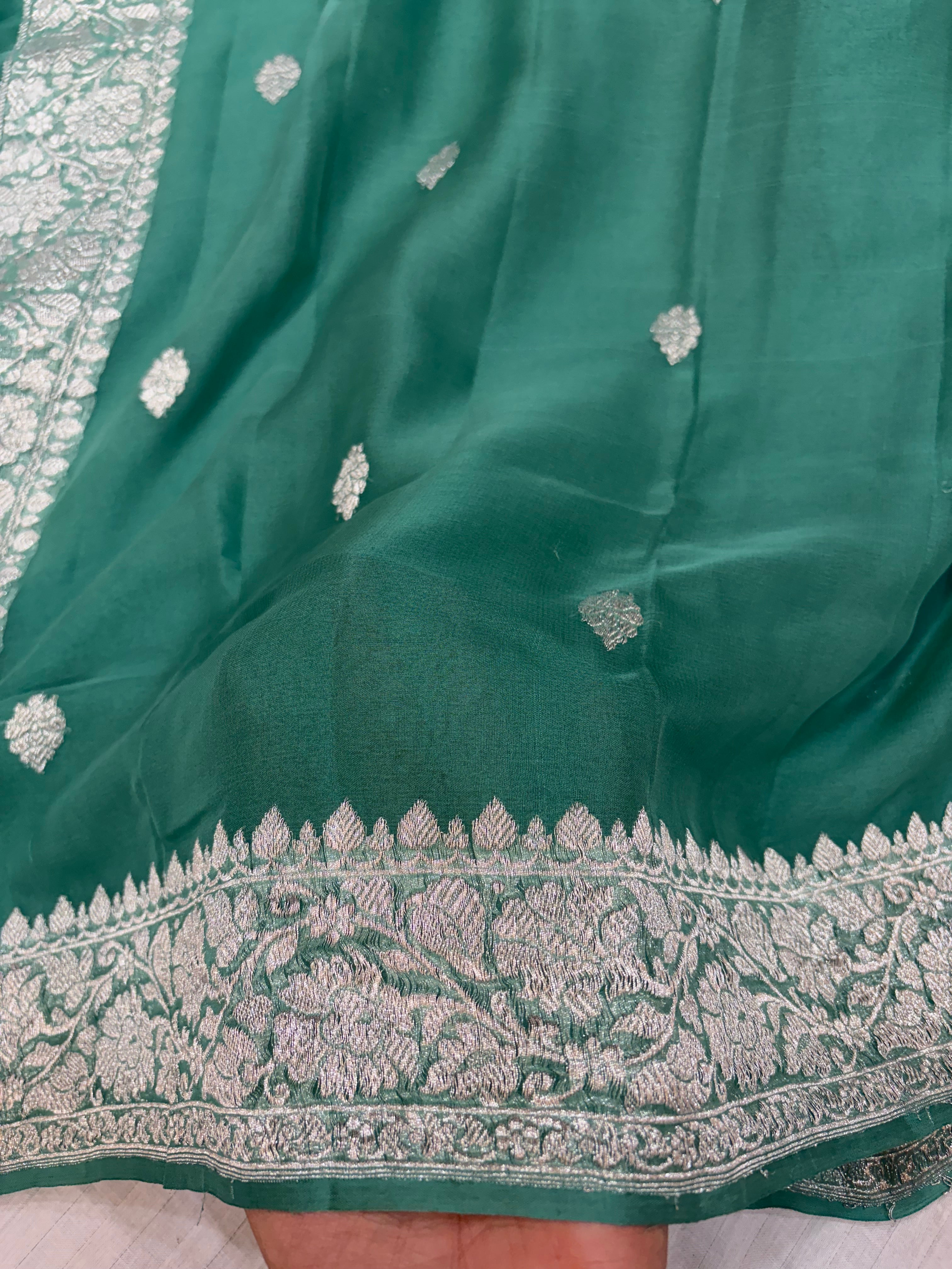 Pure khaddi chiffon saree in Teal green colour