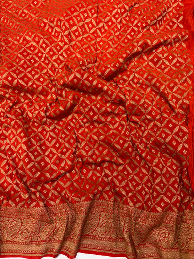 Pure khaddi crepe silk saree in bottle green with burnt orange  colour