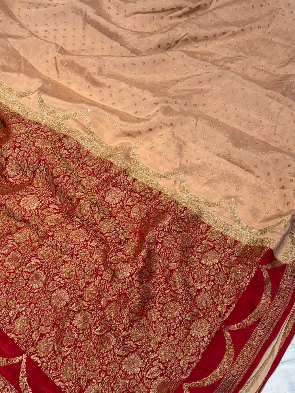 Pure khaddi crepe silk saree in Peach with Red colour
