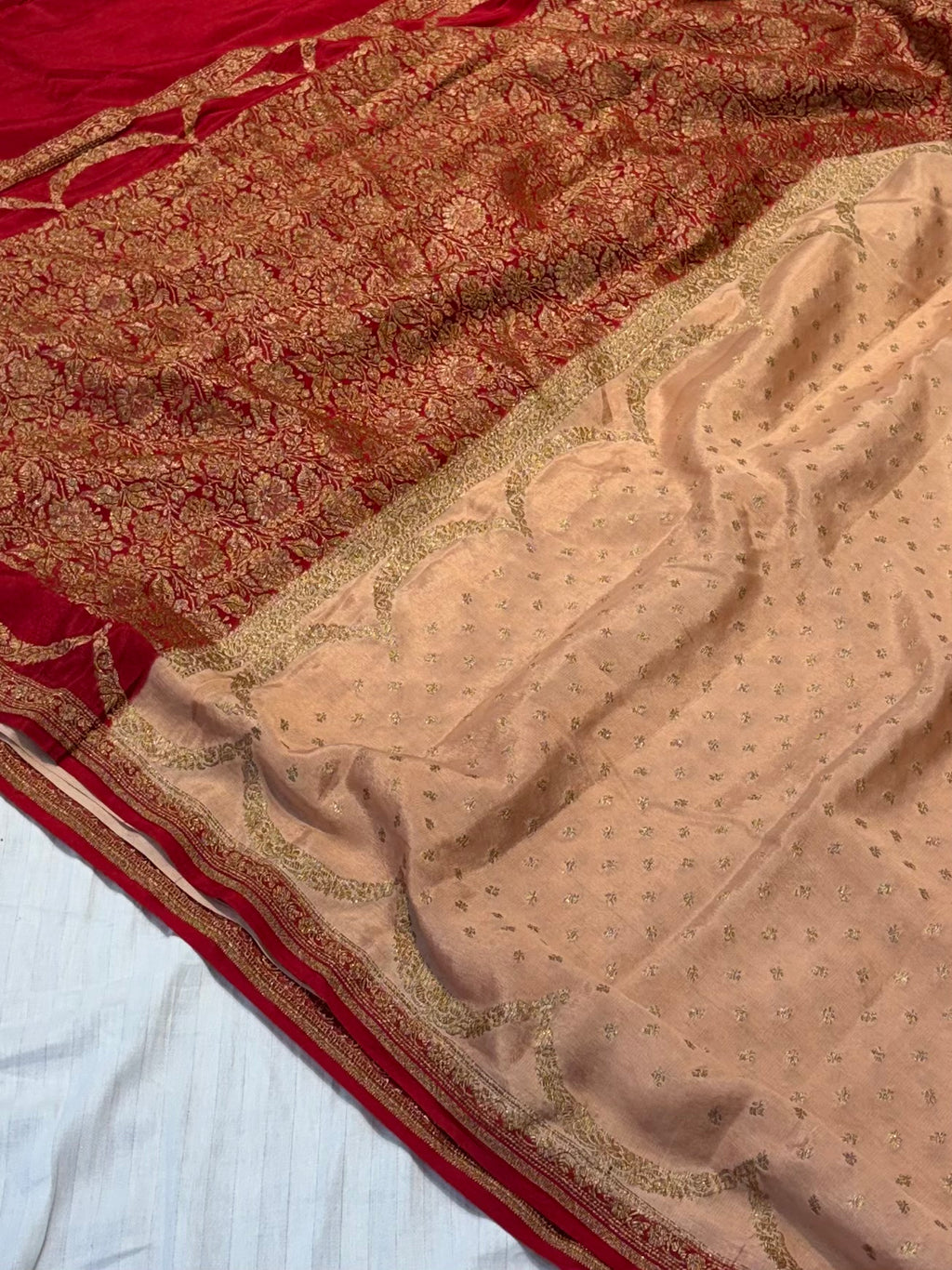Pure khaddi crepe silk saree in Peach with Red colour