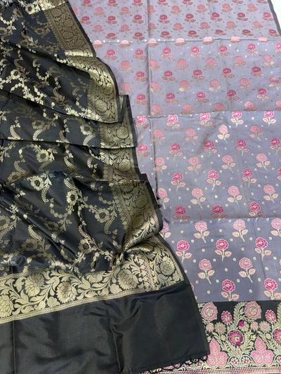 Banarasi soft silk suit in powder  with black colour