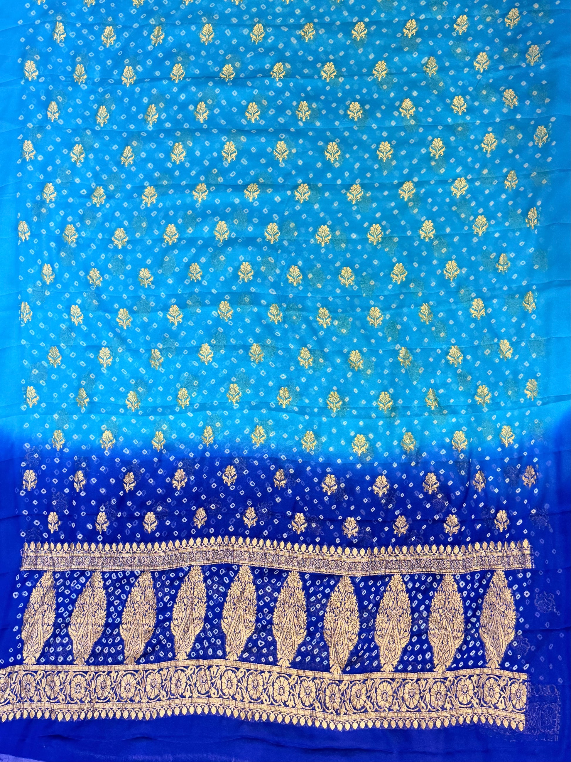 Pure georgette bandhani suit in Firozi with royal blue colour