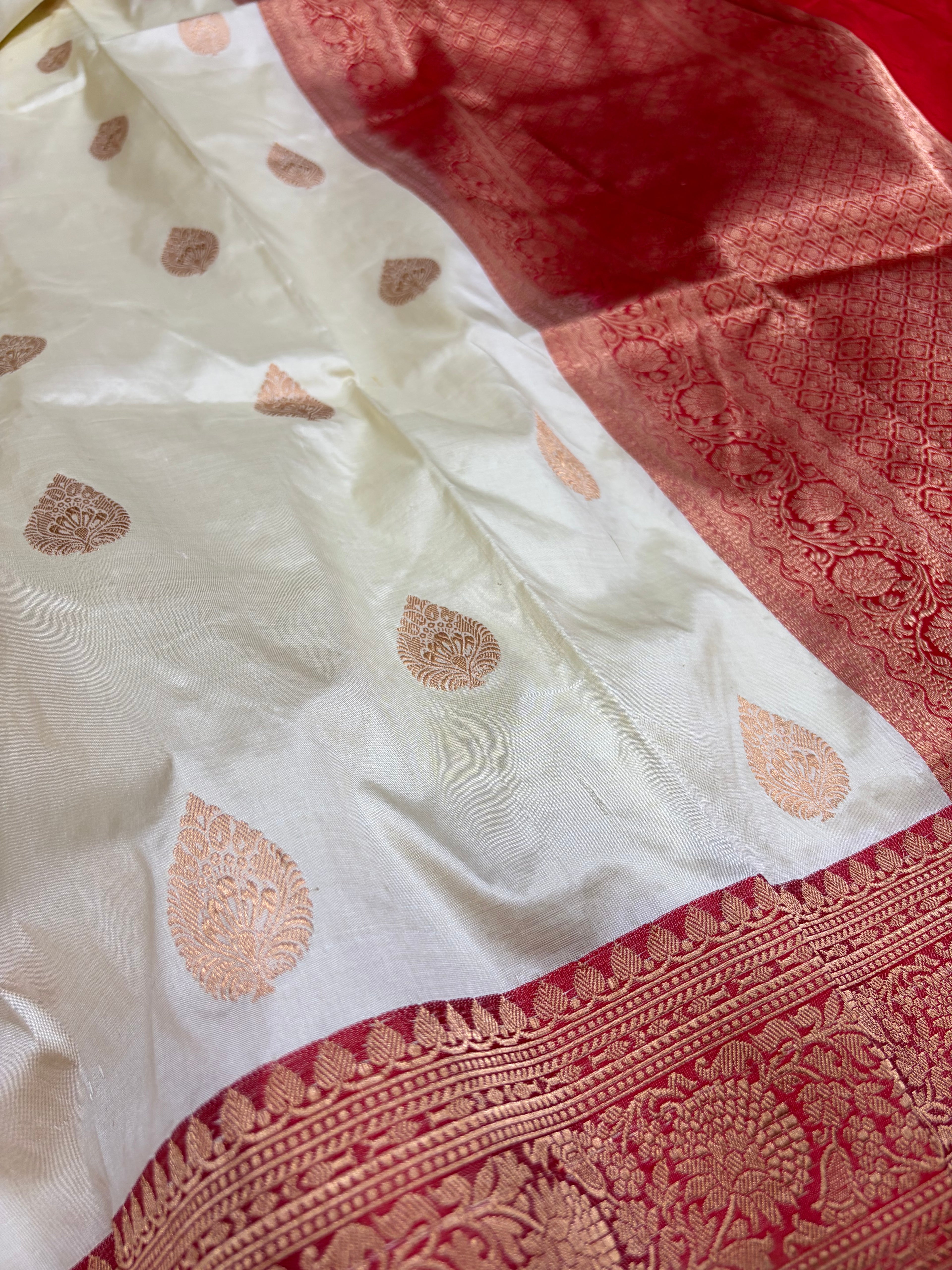 Pure handwoven katan silk saree in off white with red colour
