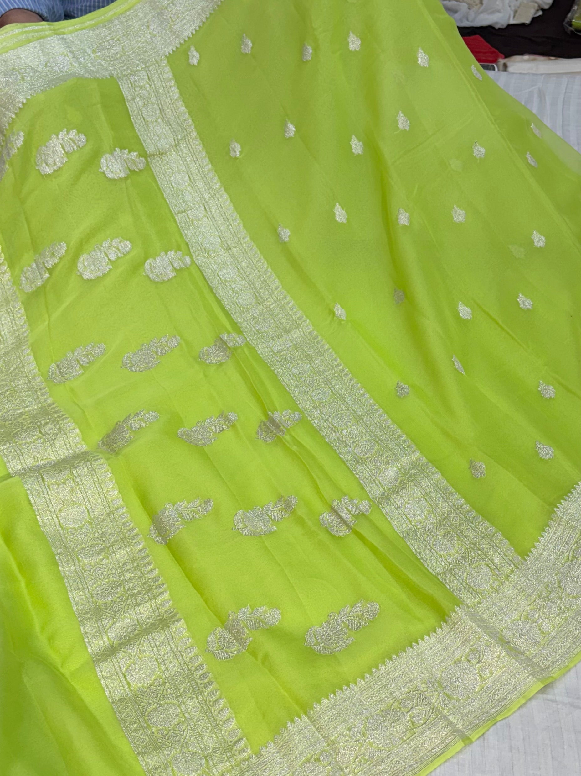Pure khaddi chiffon saree in neon green colour