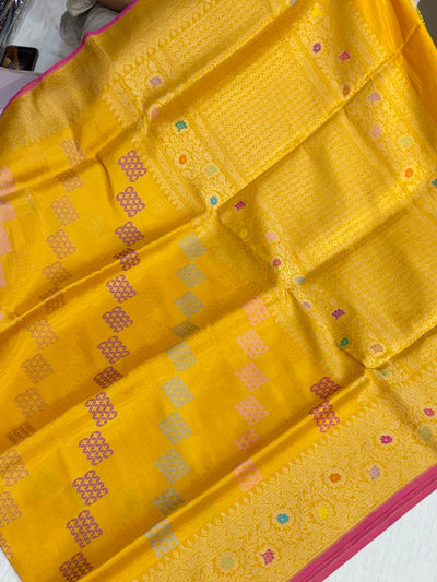 Pure katan tissue silk saree in gold colour with multiple meenakari work