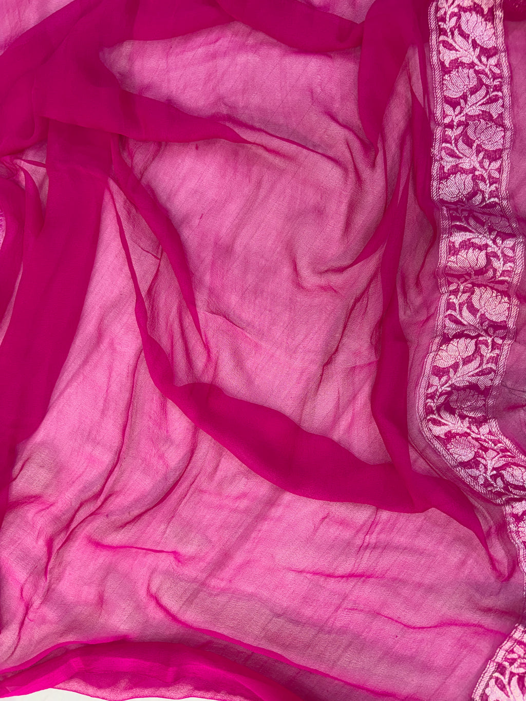 Pure khaddi chiffon saree in baby pink with Rani colour with tussles