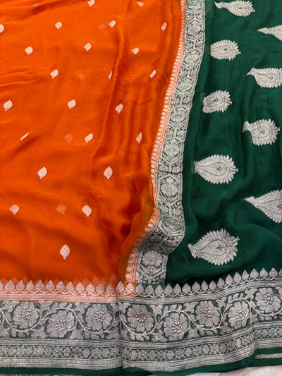 Pure khaddi chiffon saree in rust orange with bottle green colour