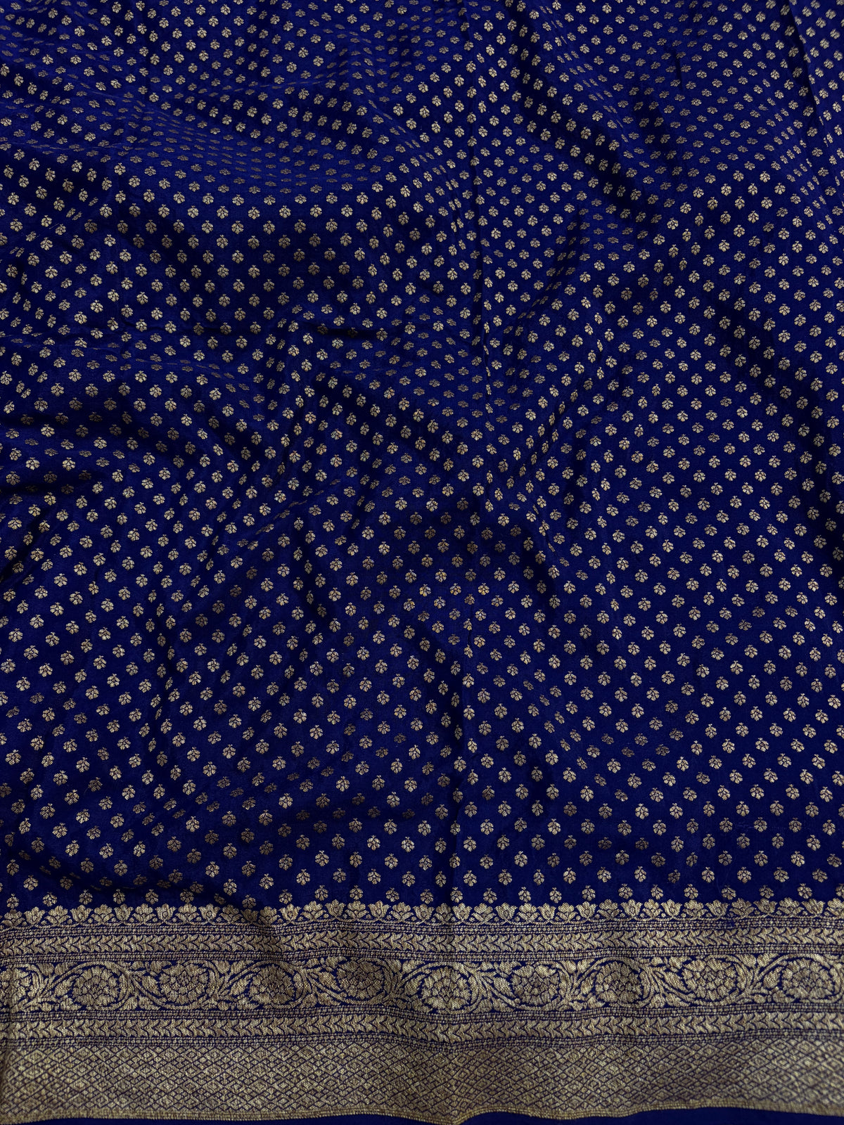 Pure khaddi crepe silk saree with all over jaal work in Rani with navy blue colour combination