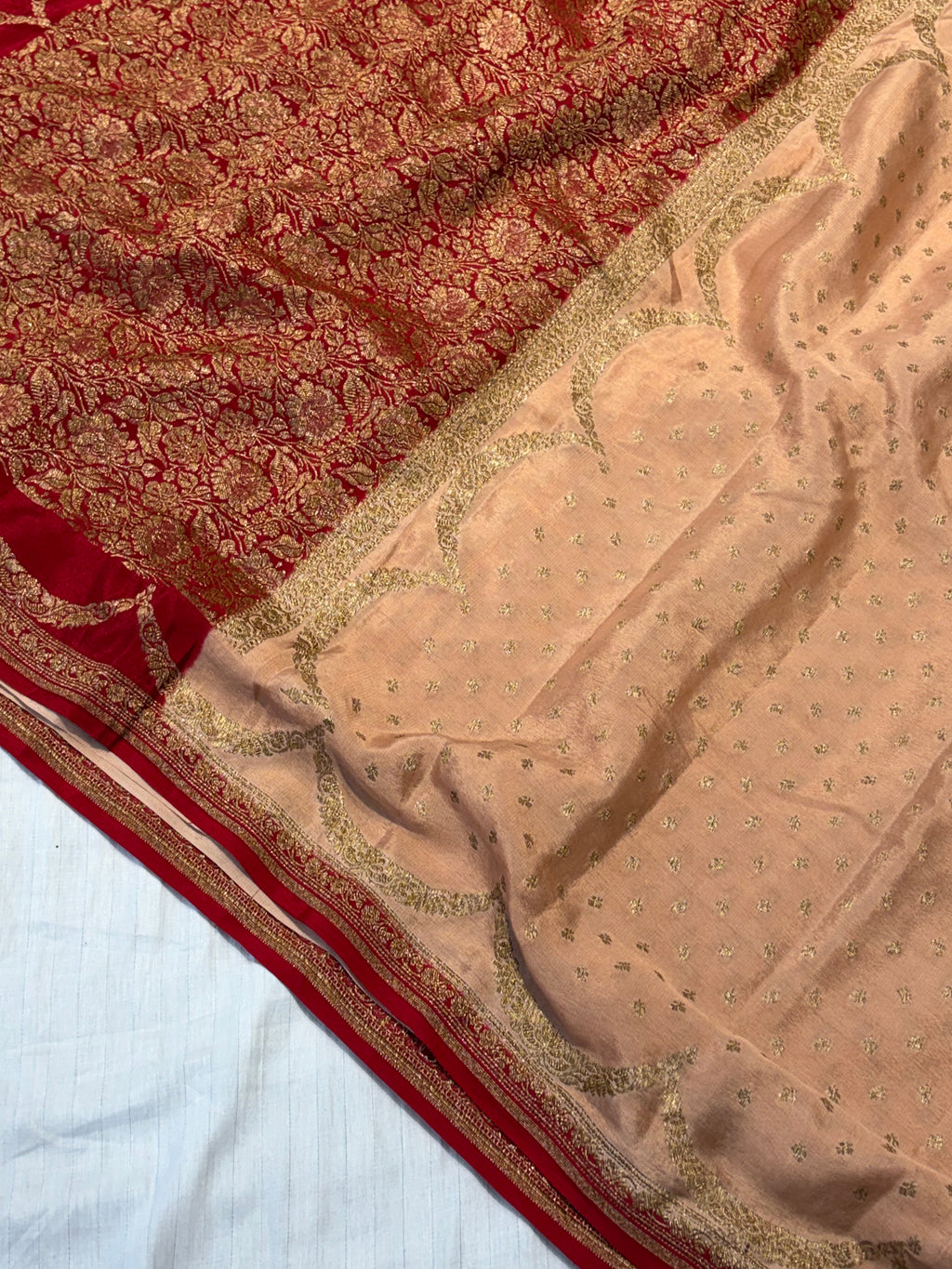 Pure khaddi crepe silk saree in Peach with Red colour