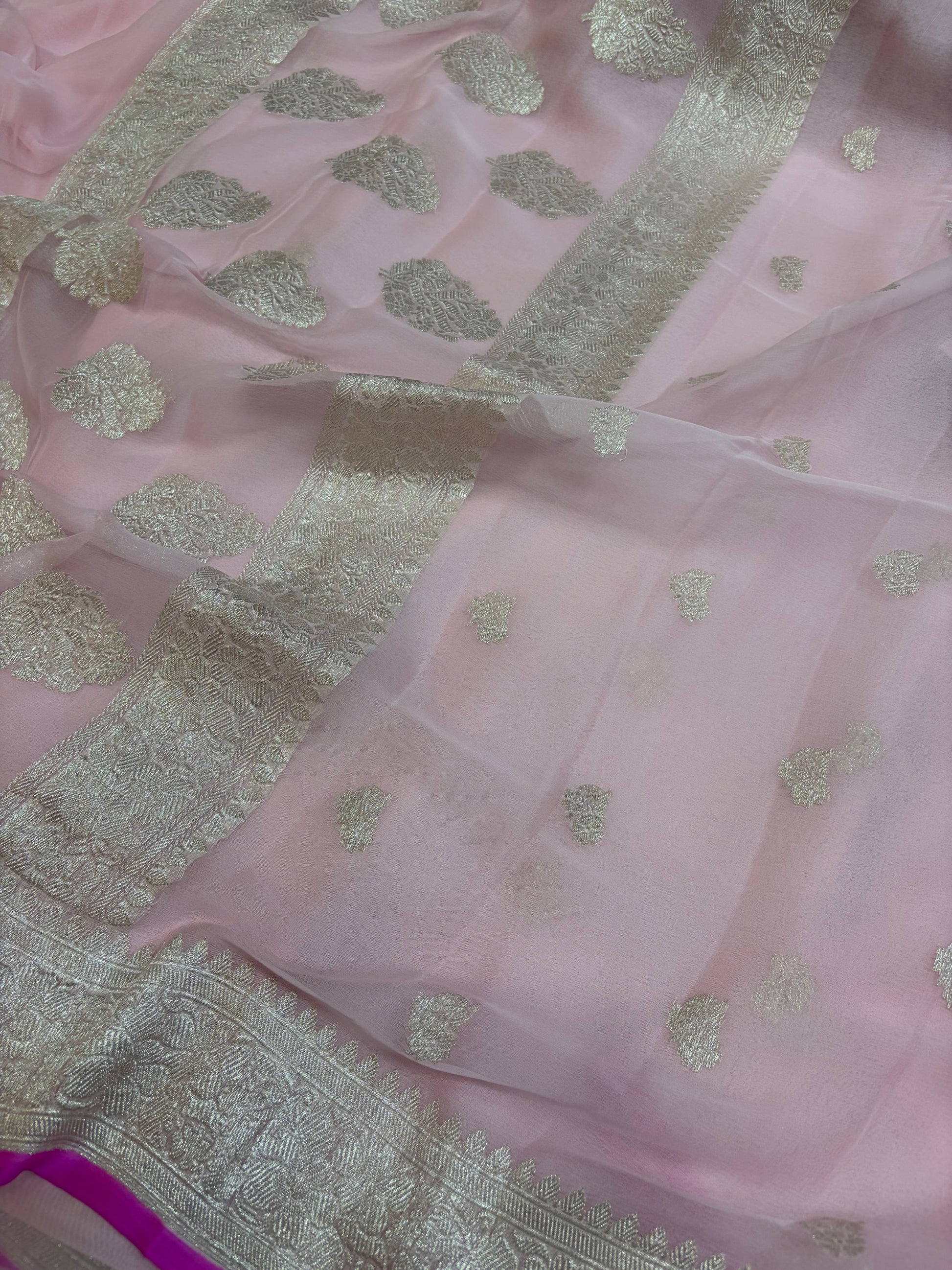 Pure khaddi chiffon saree in baby pink colour with Rani piping border
