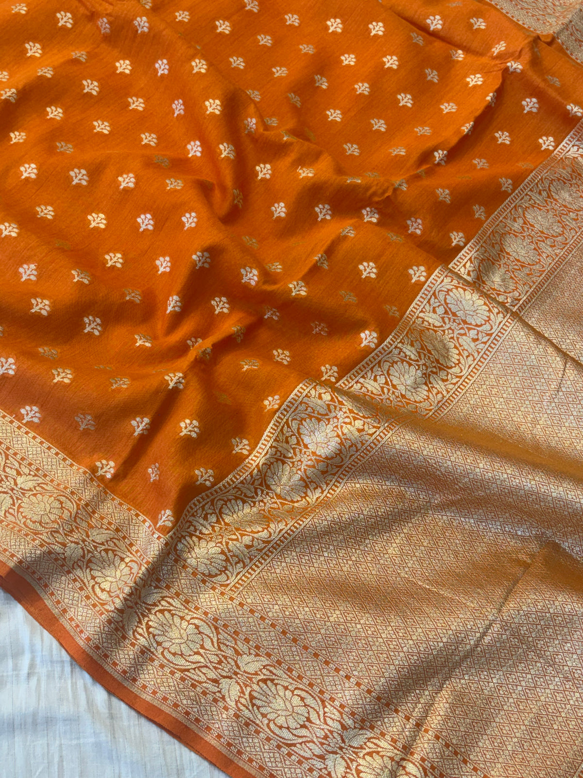 Pure moonga silk saree in orange colour