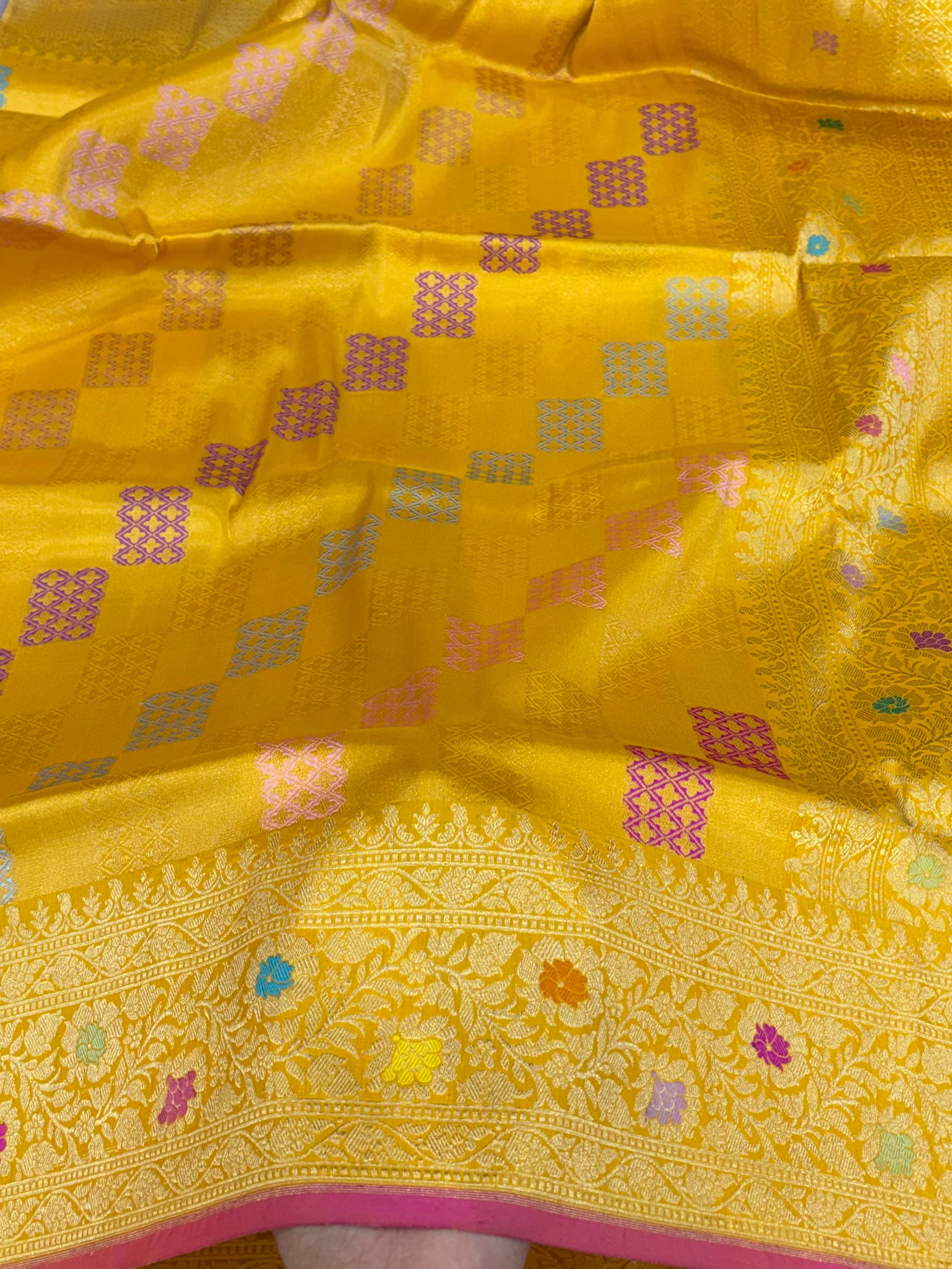 Pure katan tissue silk saree in gold colour with multiple meenakari work